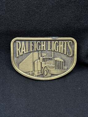 Raleigh Lights Belt Buckle Brass Tone Transportation Semi Trucks